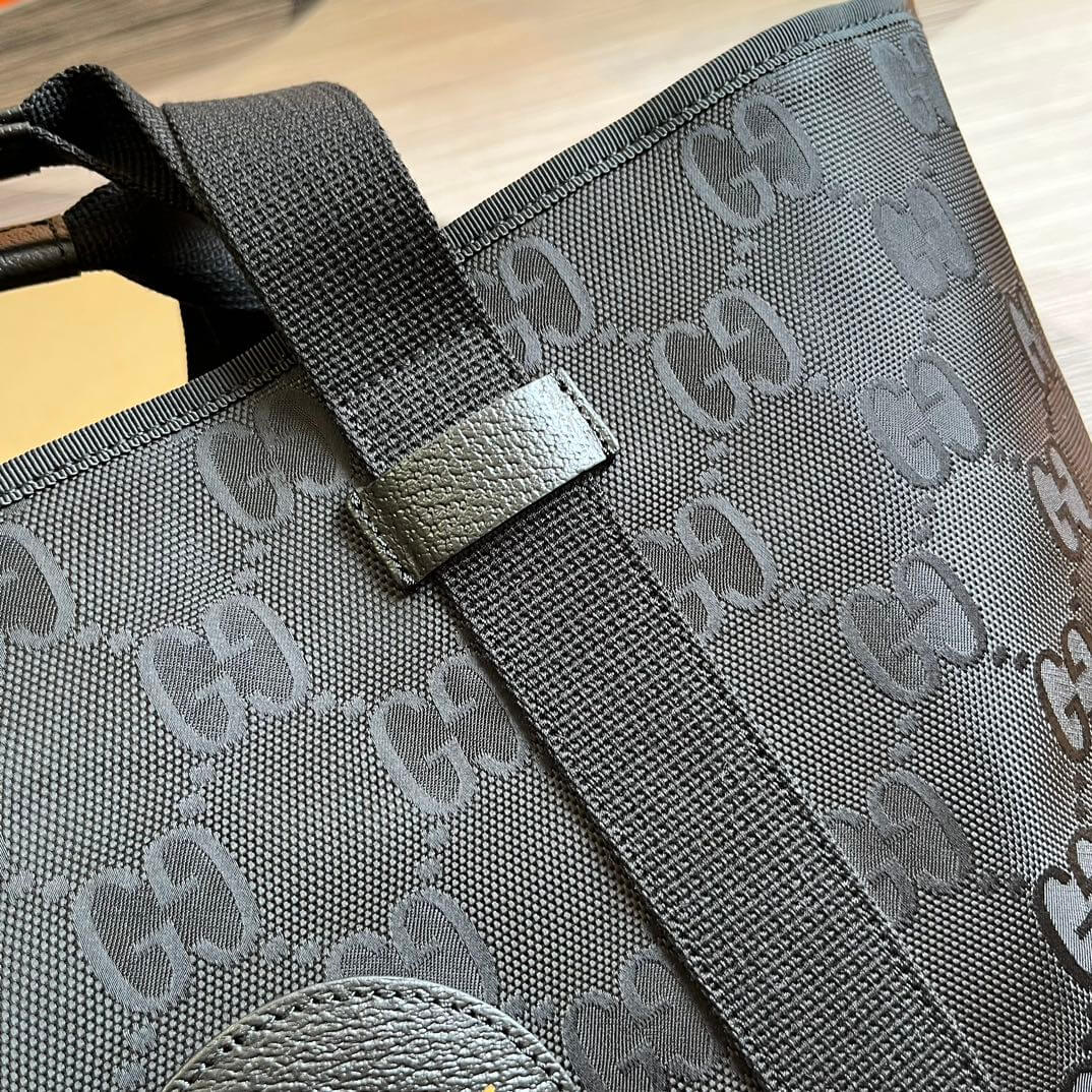 gg746037 off the grid handbag 39cm black cowhide