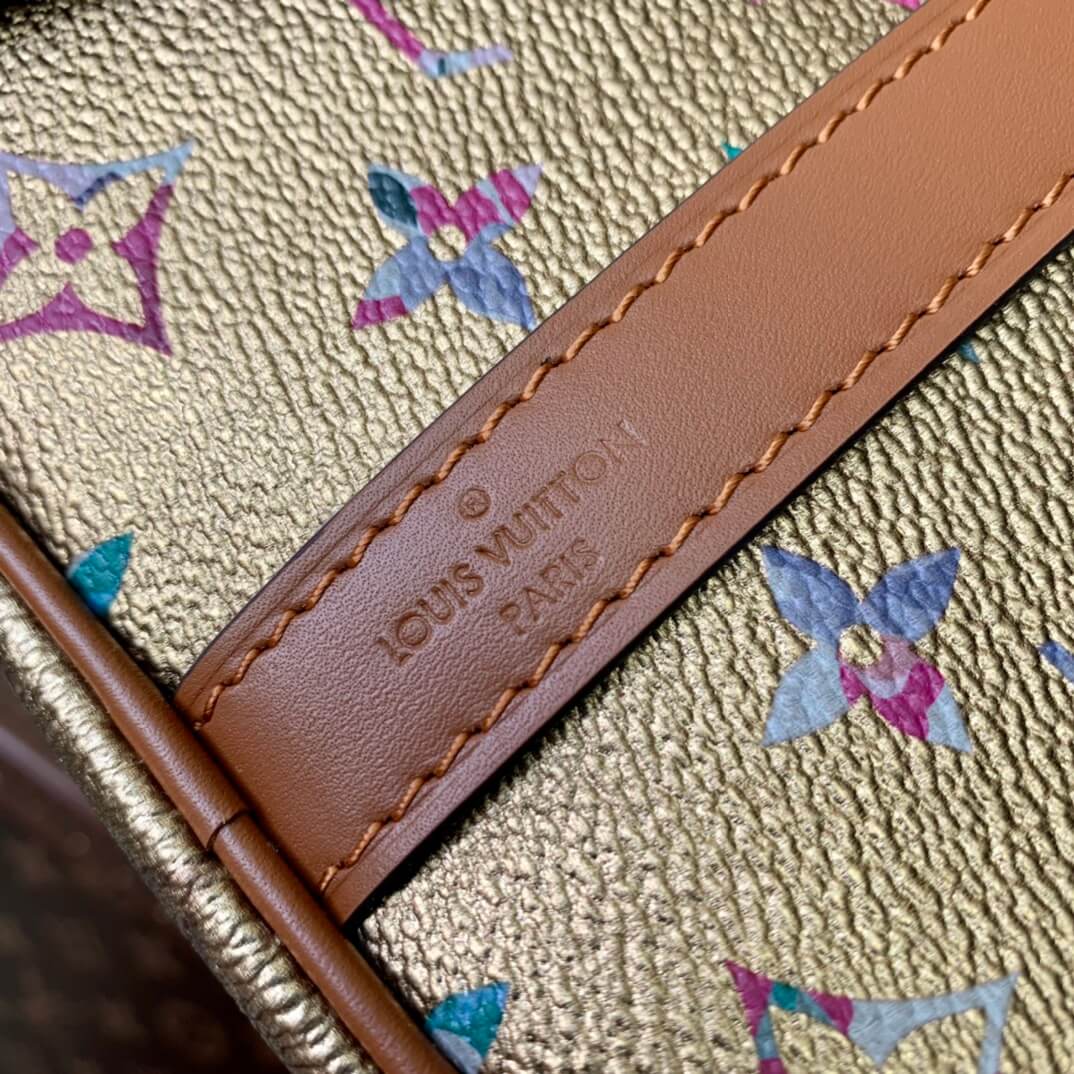 m21317 speedy bandouliere 25cm travel bag metallic coated canvas