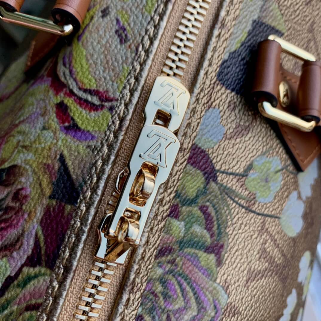 m21317 speedy bandouliere 25cm travel bag metallic coated canvas