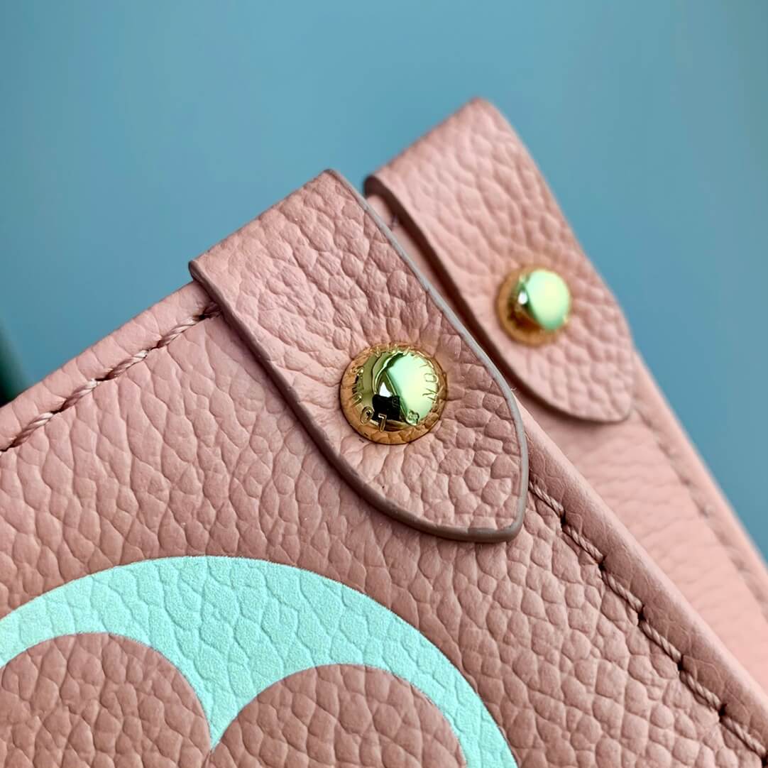 m45595 onthego mm monogram empreinte leather pink 35cm