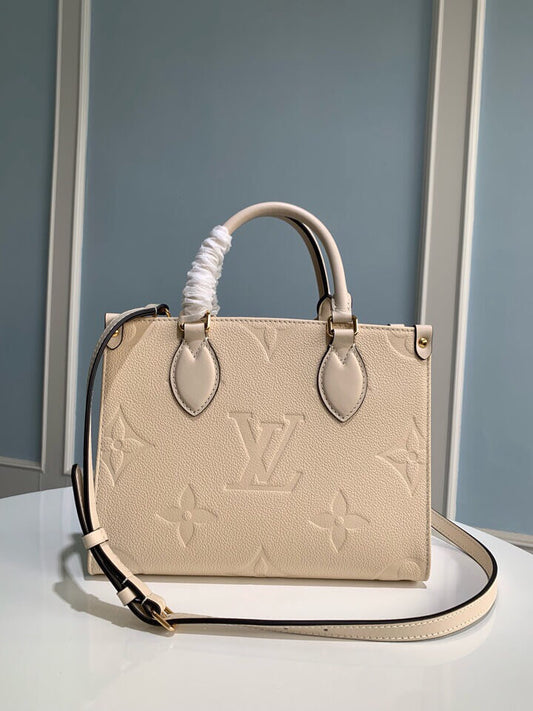 m45653 onthego pm monogram empreinte leather white 25cm