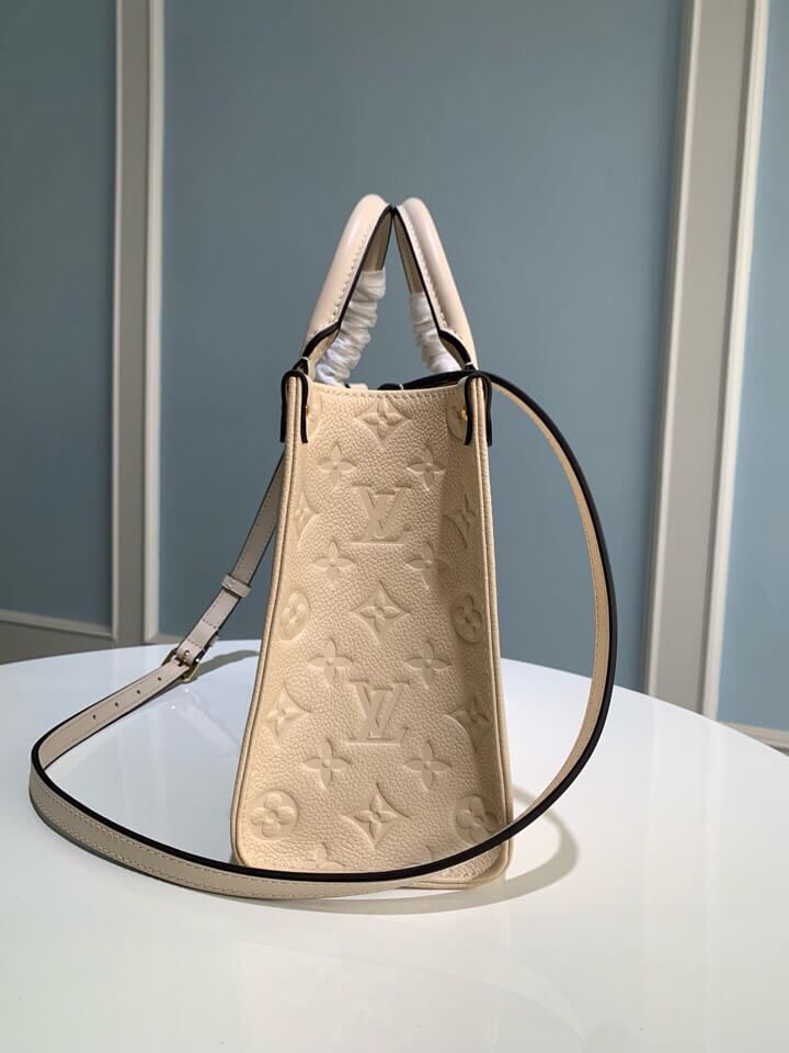 m45653 onthego pm monogram empreinte leather white 25cm