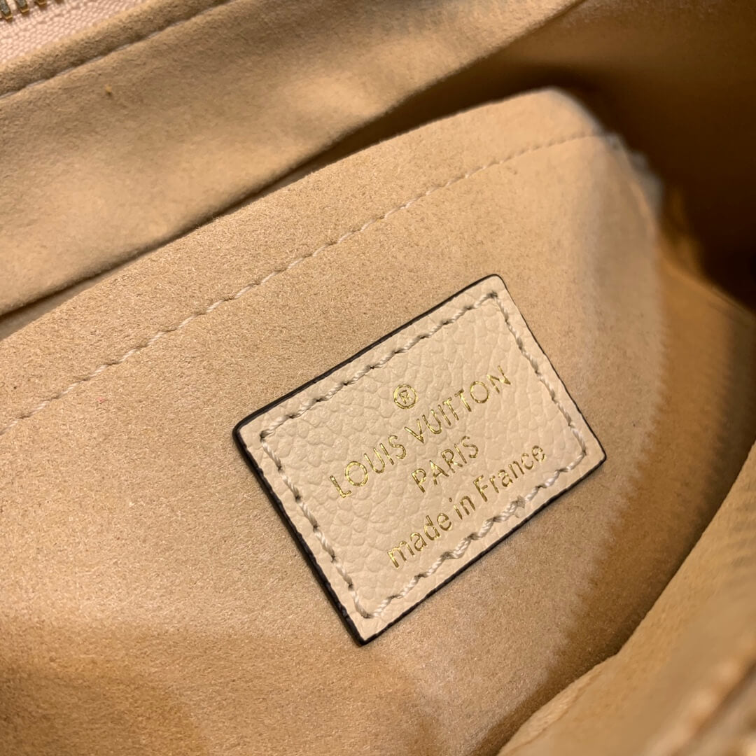 m46099 bagatelle monogram empreinte milk white 22cm