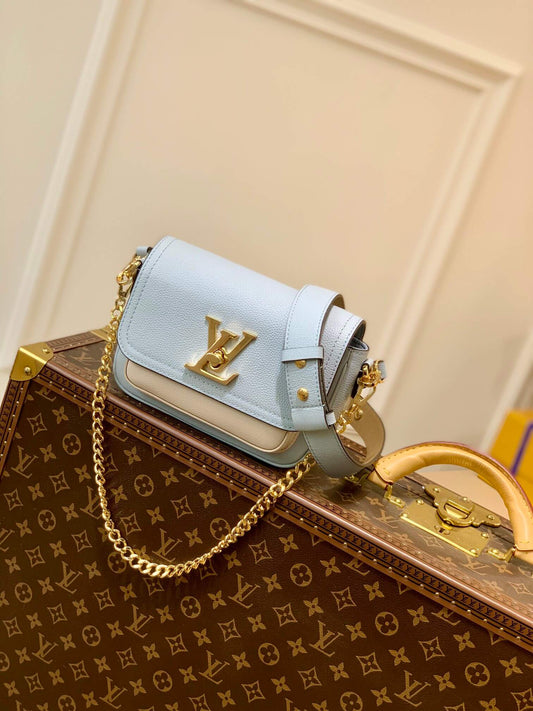 m58557 lockme tender shoulder bag cross body bags blue lambskin
