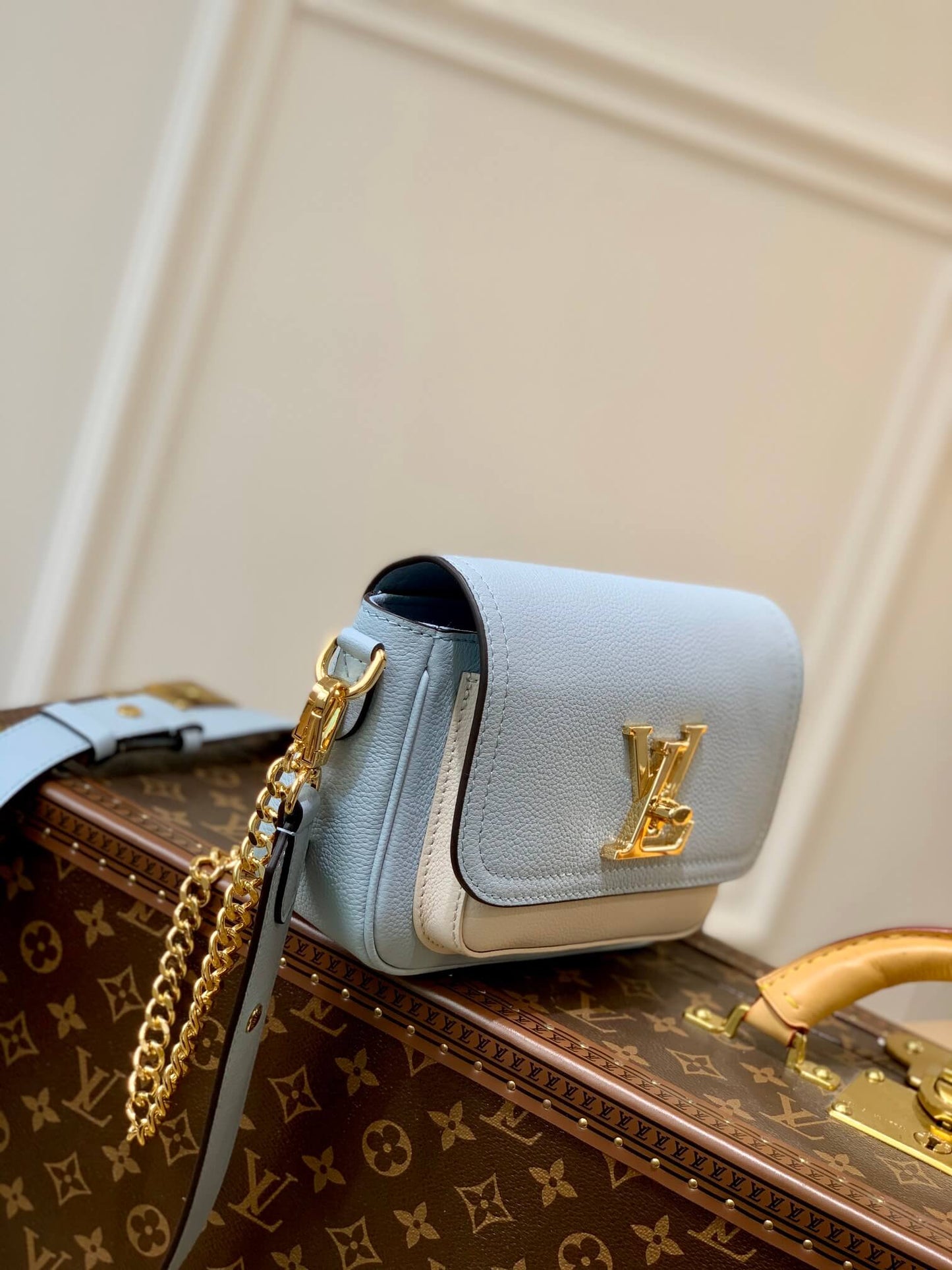m58557 lockme tender shoulder bag cross body bags blue lambskin