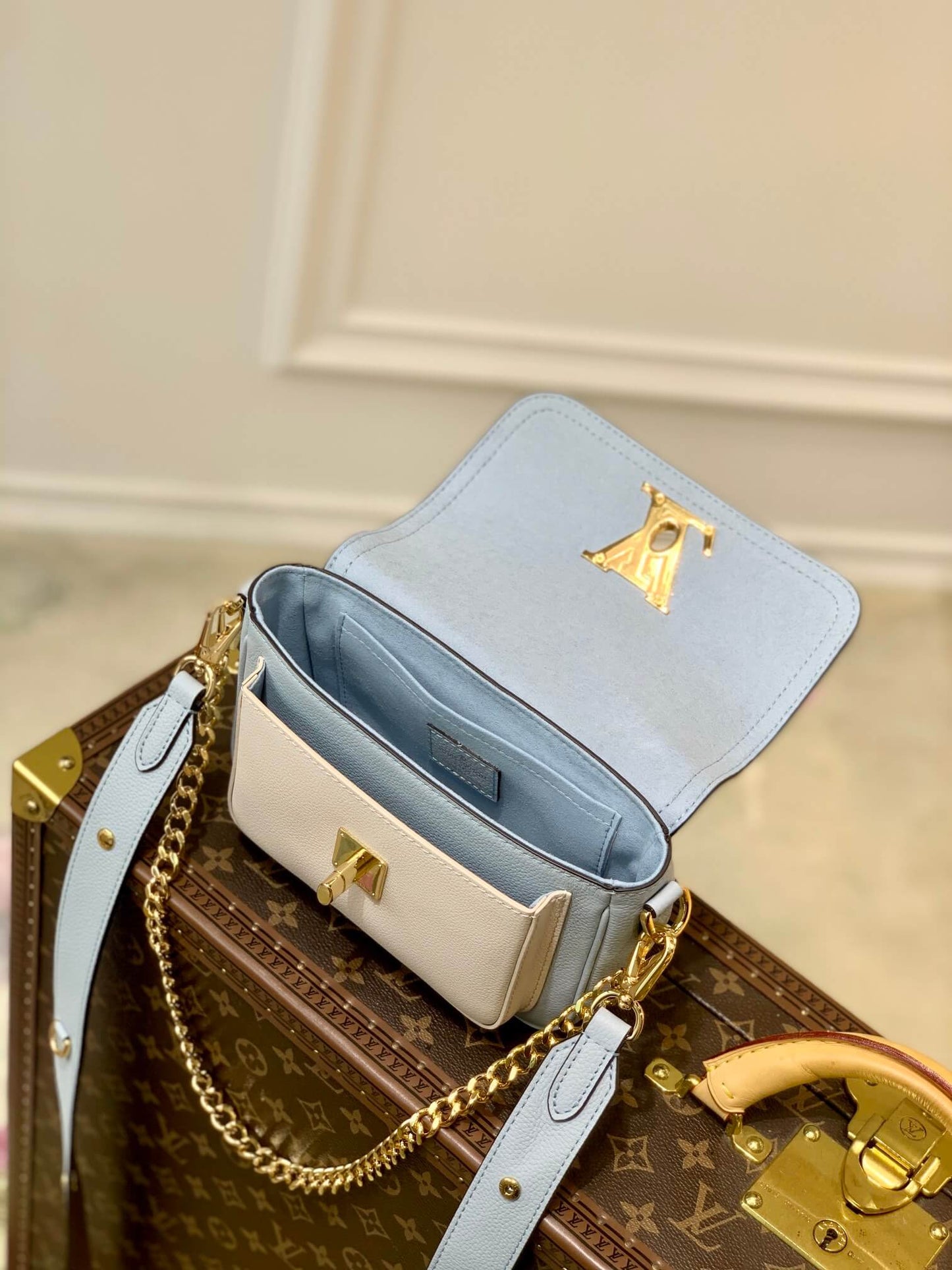 m58557 lockme tender shoulder bag cross body bags blue lambskin