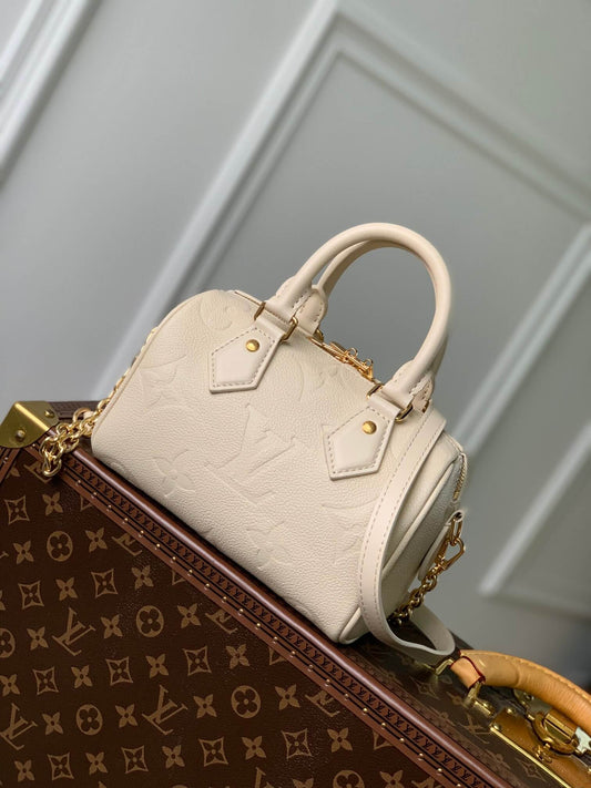 m58953 speedy bandouliere 20 5cm milk white handbag embossed grained cowhide leather