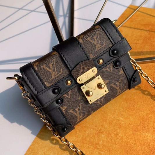 m68566 essential trunk monogram black