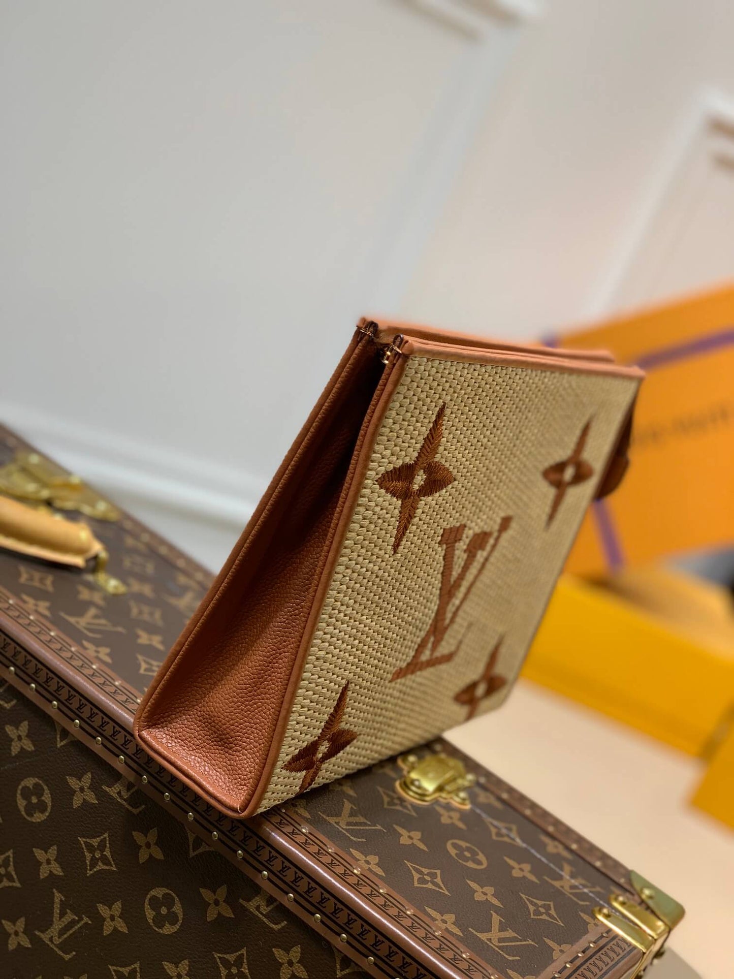 m80351 apricot monogram raffia 25cm clutch bag