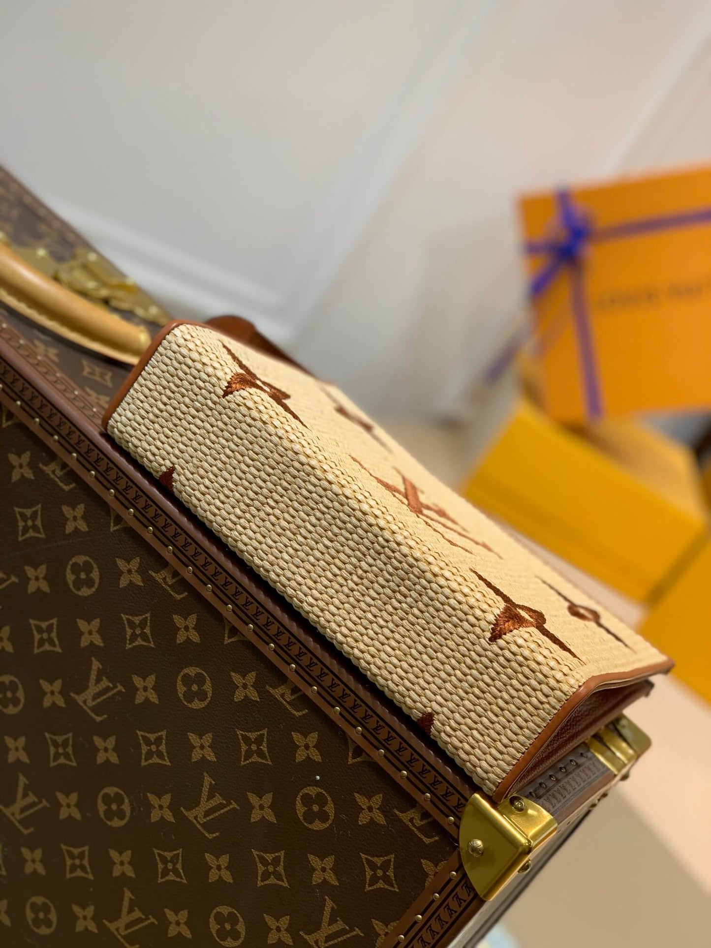 m80351 apricot monogram raffia 25cm clutch bag