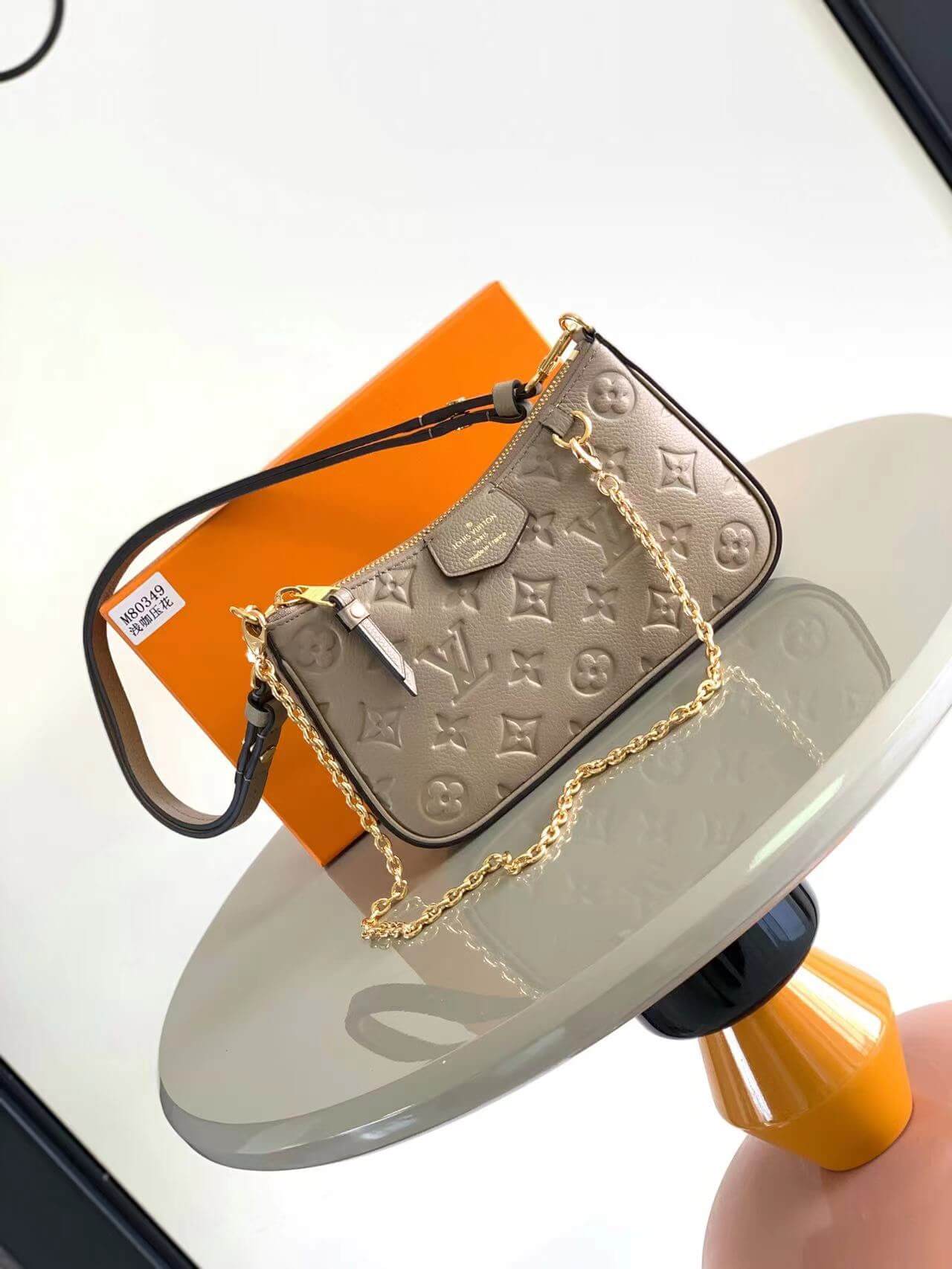 m81066 easy pouch on strap elephant grey embossing 19cm