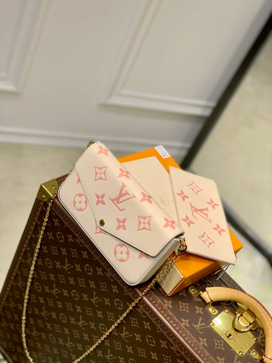 m82047 pochette felicie monogram 21cm myosotis apricot