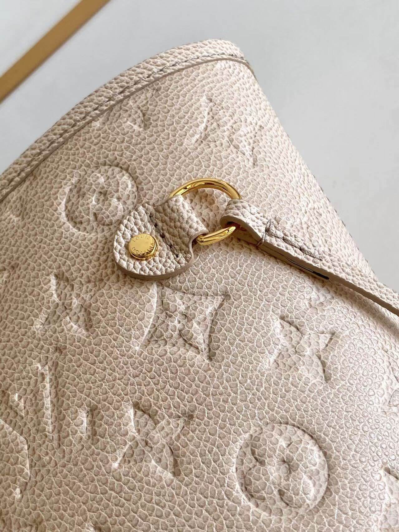 m58525 neverfull monogram empreinte handbag apricot new colors 2022