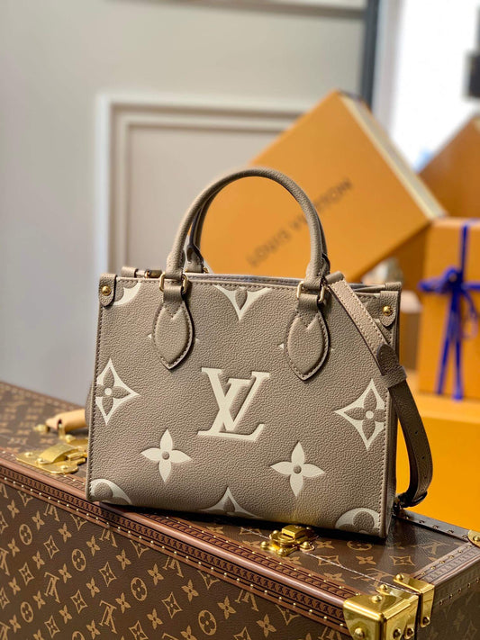 lv onthego pm tote bag monogrm empreinte leather grey m45659