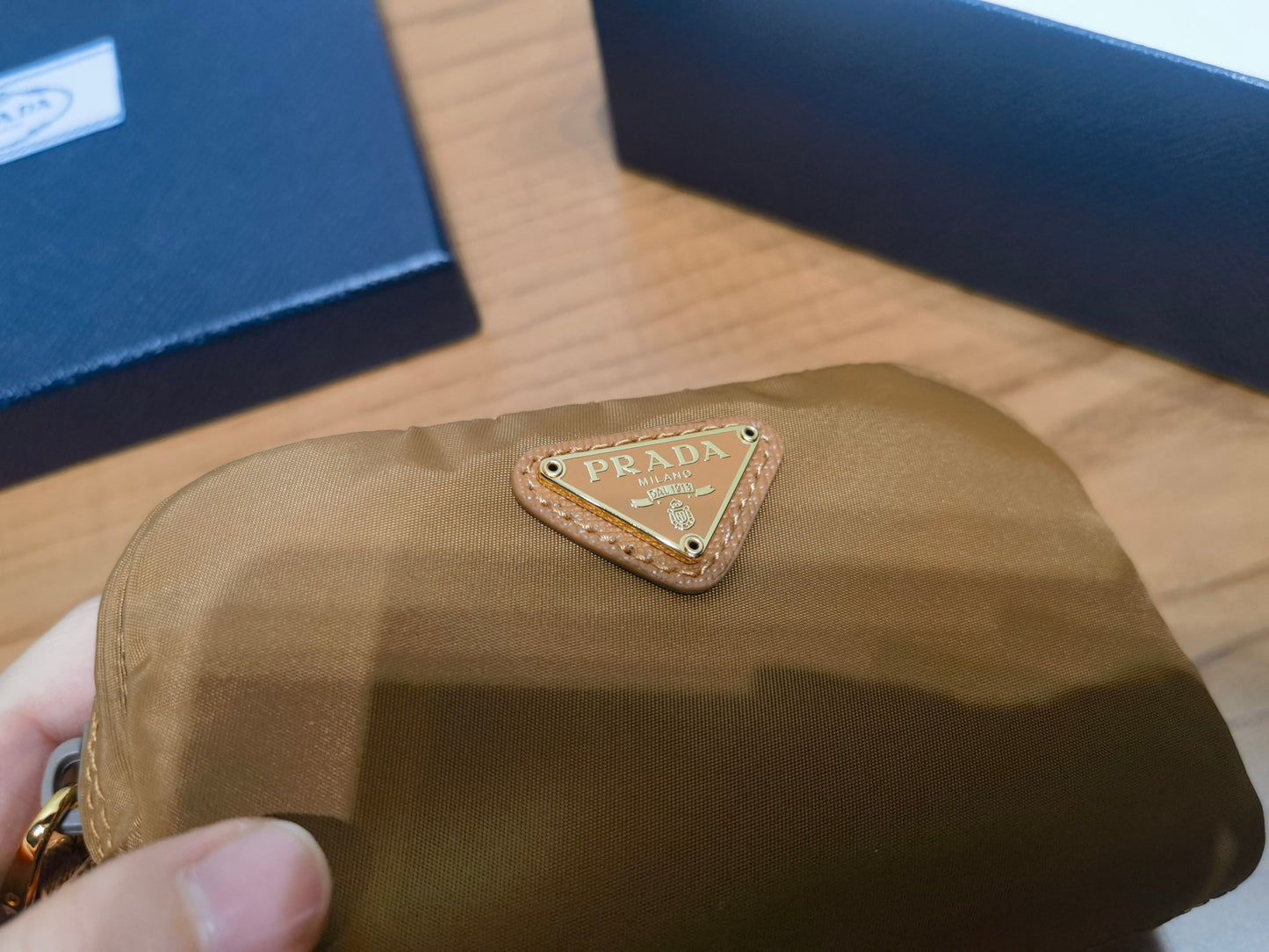 prada New Recycled Nylon Handbag 1NA339 brown gold