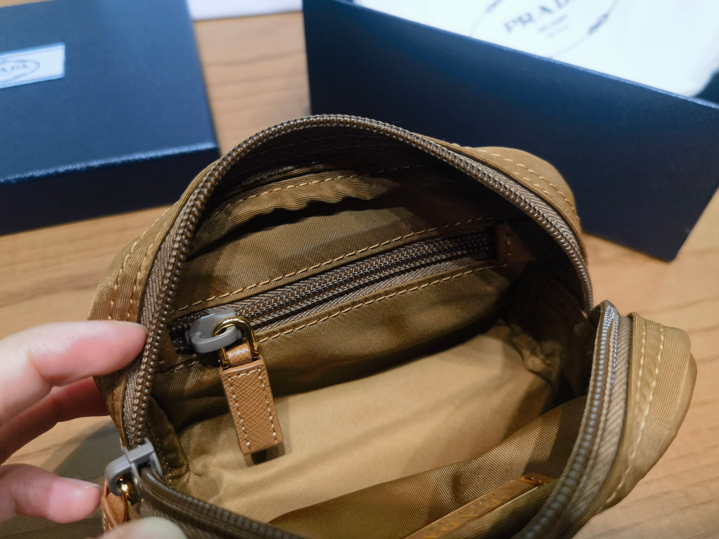 prada New Recycled Nylon Handbag 1NA339 brown gold