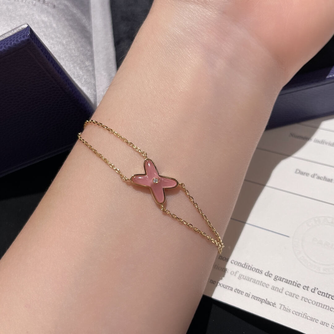 pink bracelet  gold chain