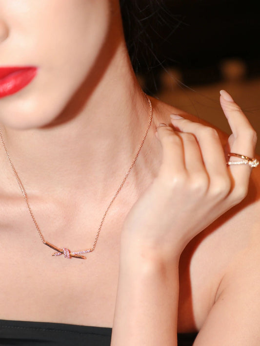 Knot necklace for women, light luxury, niche butterfly twisted knot collarbone chain XLA48