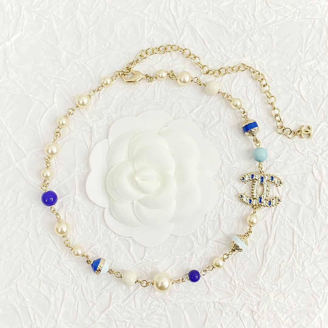 Chanel's New Trendy Blue Glass Pearl Double C Gold Necklace XLA83