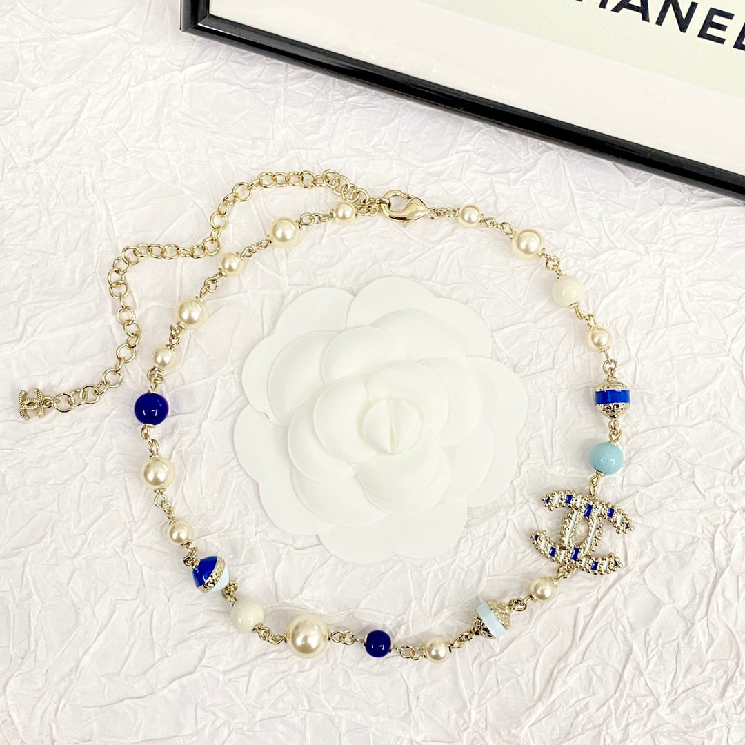 Chanel's New Trendy Blue Glass Pearl Double C Gold Necklace XLA83