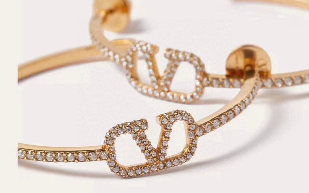 fashion versatile gold circle valentino earrings eha102