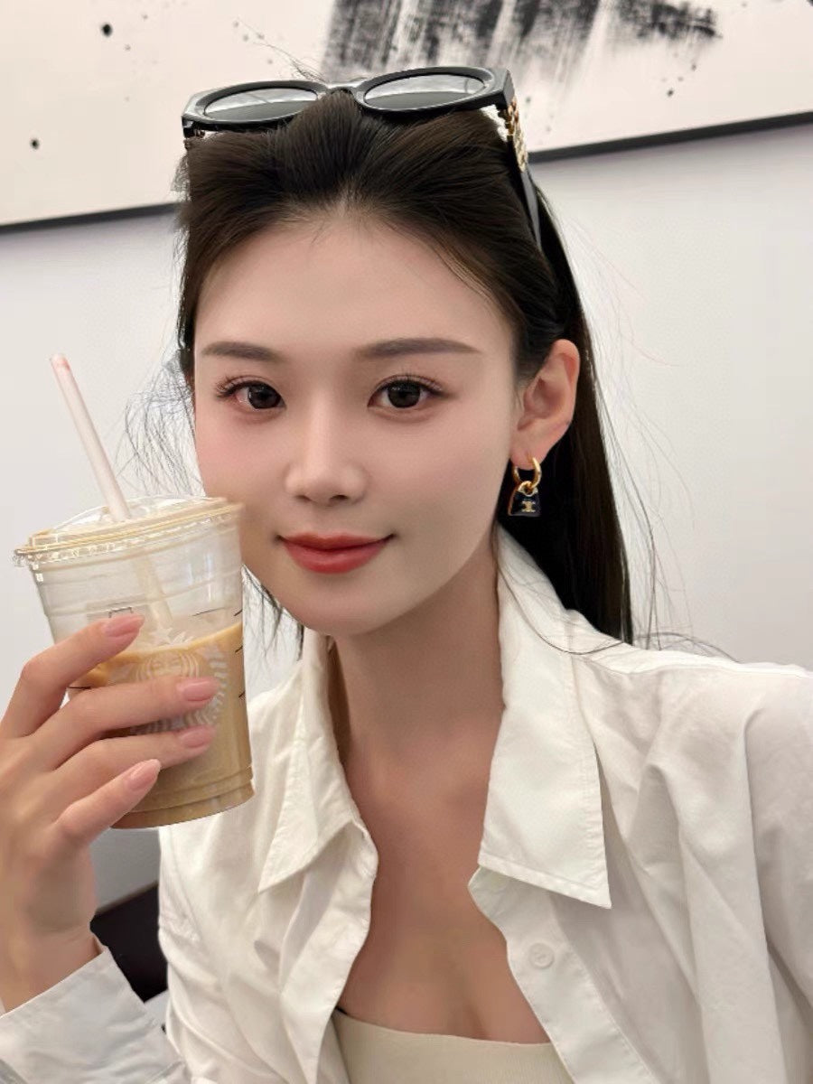 celines new black enamel personalized bag with gold earrings eha101