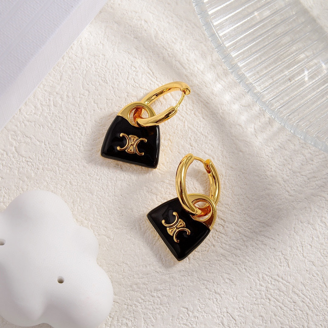 celines new black enamel personalized bag with gold earrings eha101