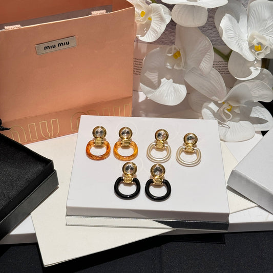 miumiu logo decorated with resin glass metal earrings ehc77