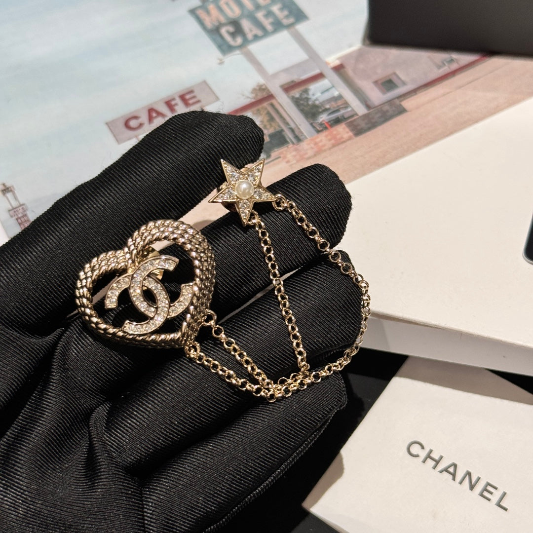 hollow woven love pentagram tassel silver brooch xzc11