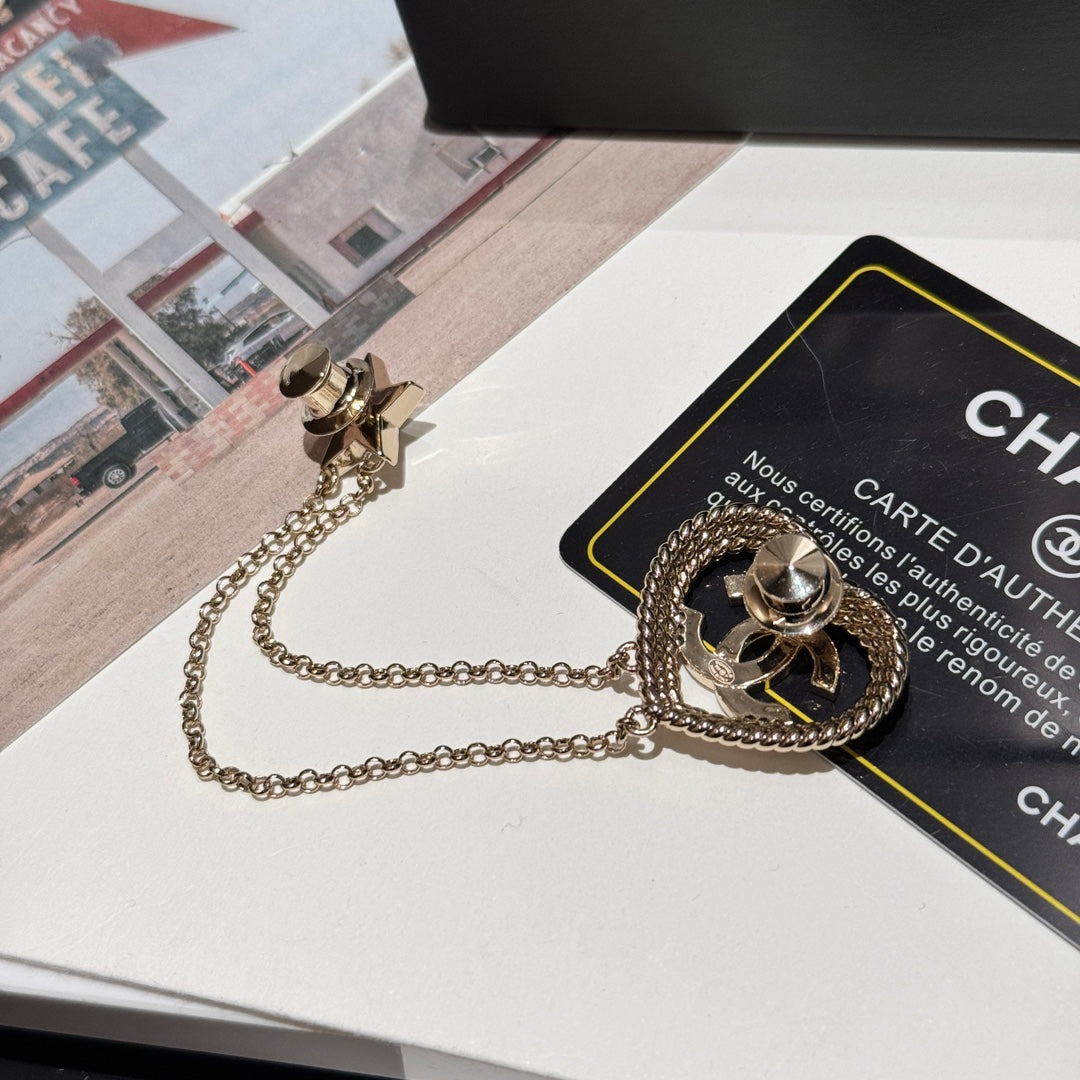 hollow woven love pentagram tassel silver brooch xzc11