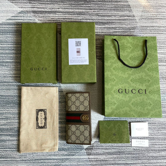 coffee oval interlocking long clip wallet 672987