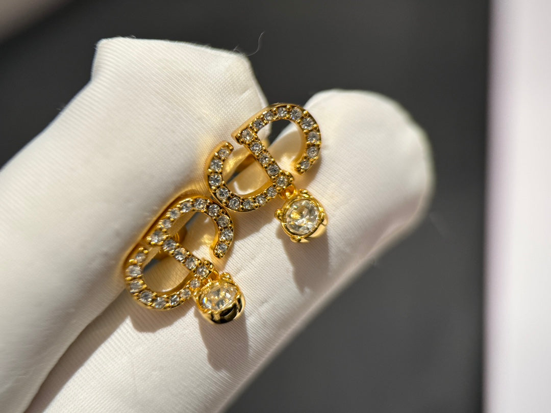 tribales series gold letter studded diamond earrings ehc115