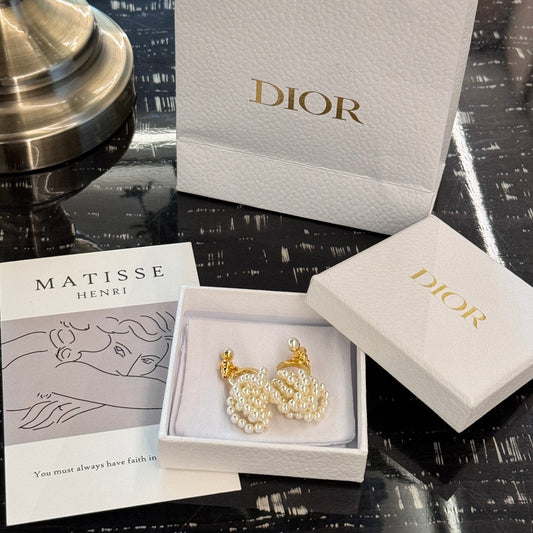 d bow gold multi layered pearl earrings ehc118