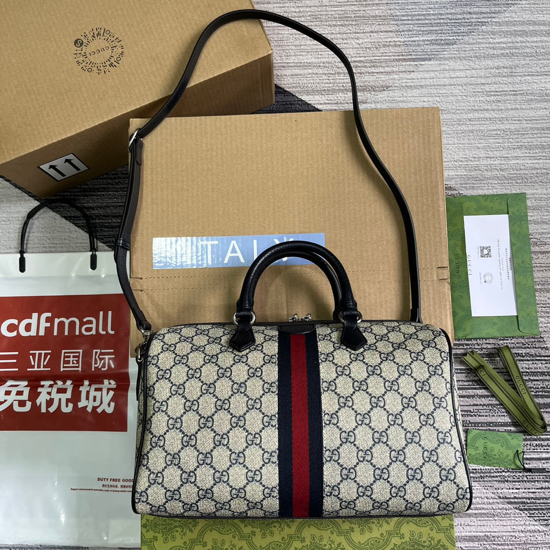 ophidia 20cm blue medium cross handbag 772065