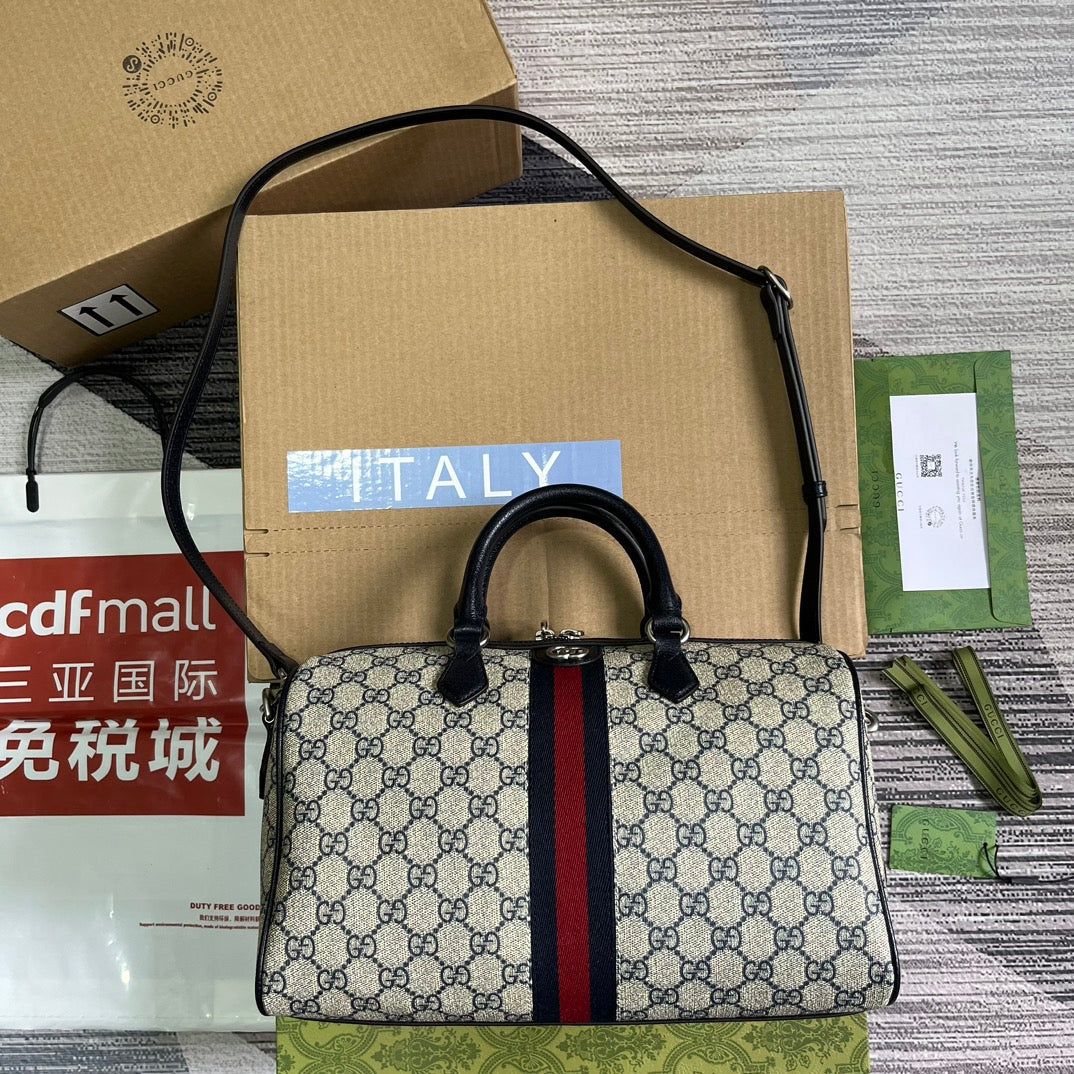 ophidia 20cm blue medium cross handbag 772065