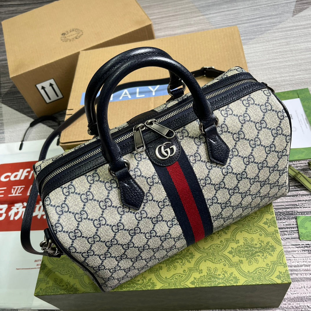 ophidia 20cm blue medium cross handbag 772065