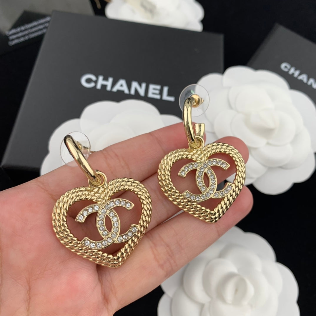 Xiaoxiang hollow heart-shaped brass earrings EHA154