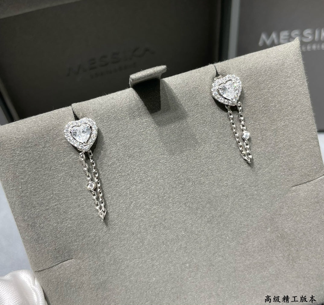 golden heart shaped earrings eha331