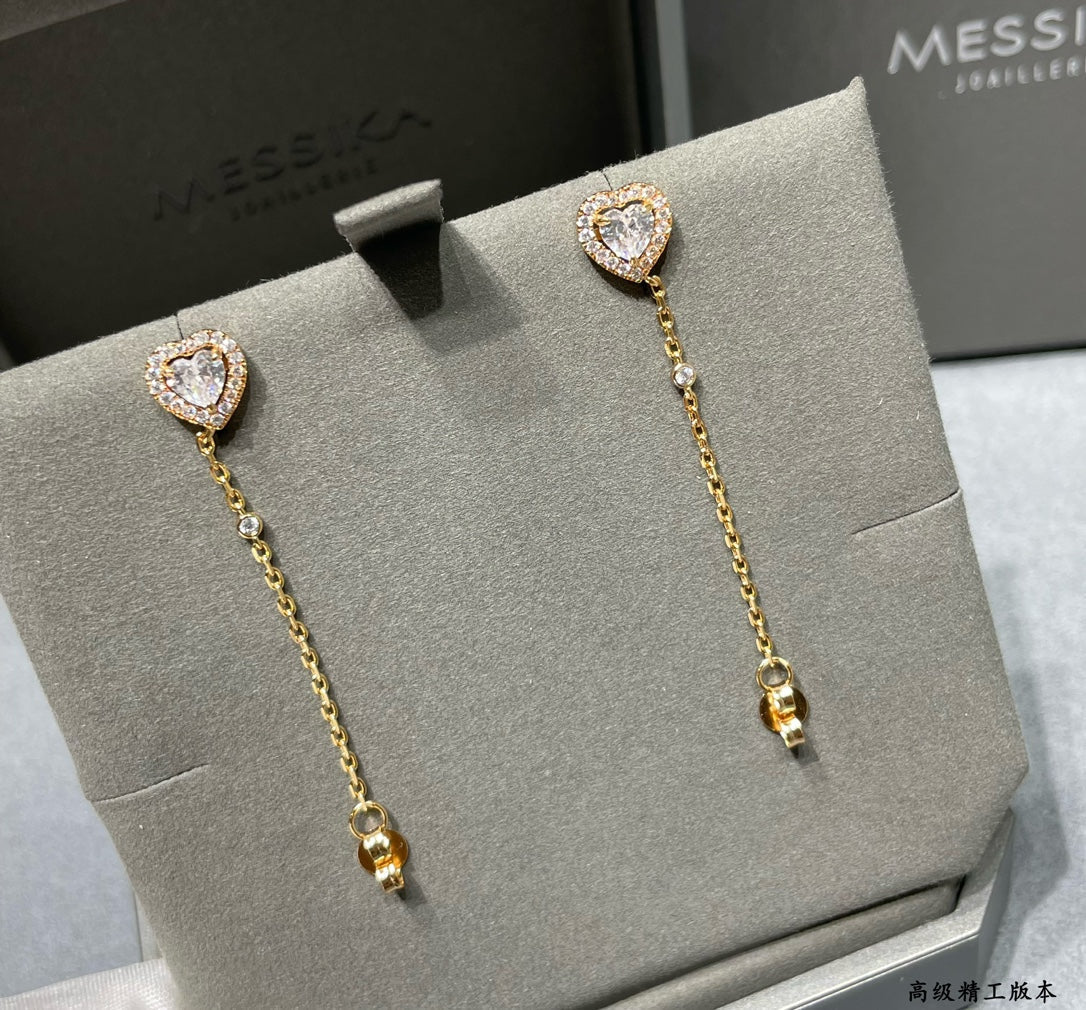 golden heart shaped earrings eha331