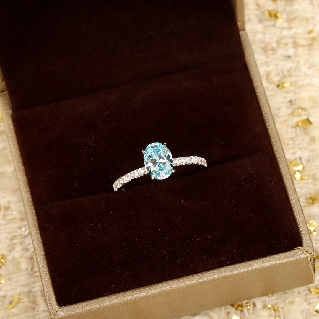 caibao series shallow sea blue egg shaped ring jza108