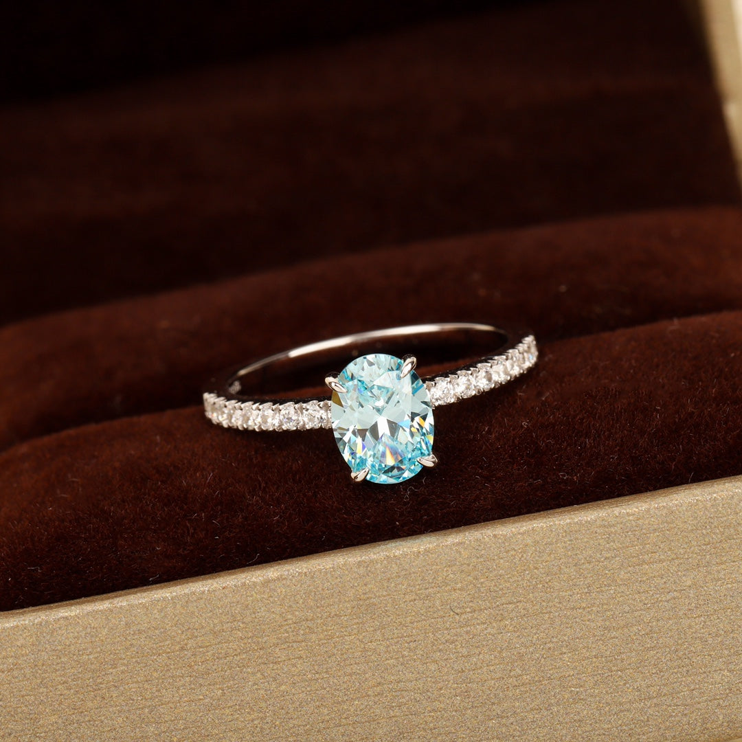 caibao series shallow sea blue egg shaped ring jza108