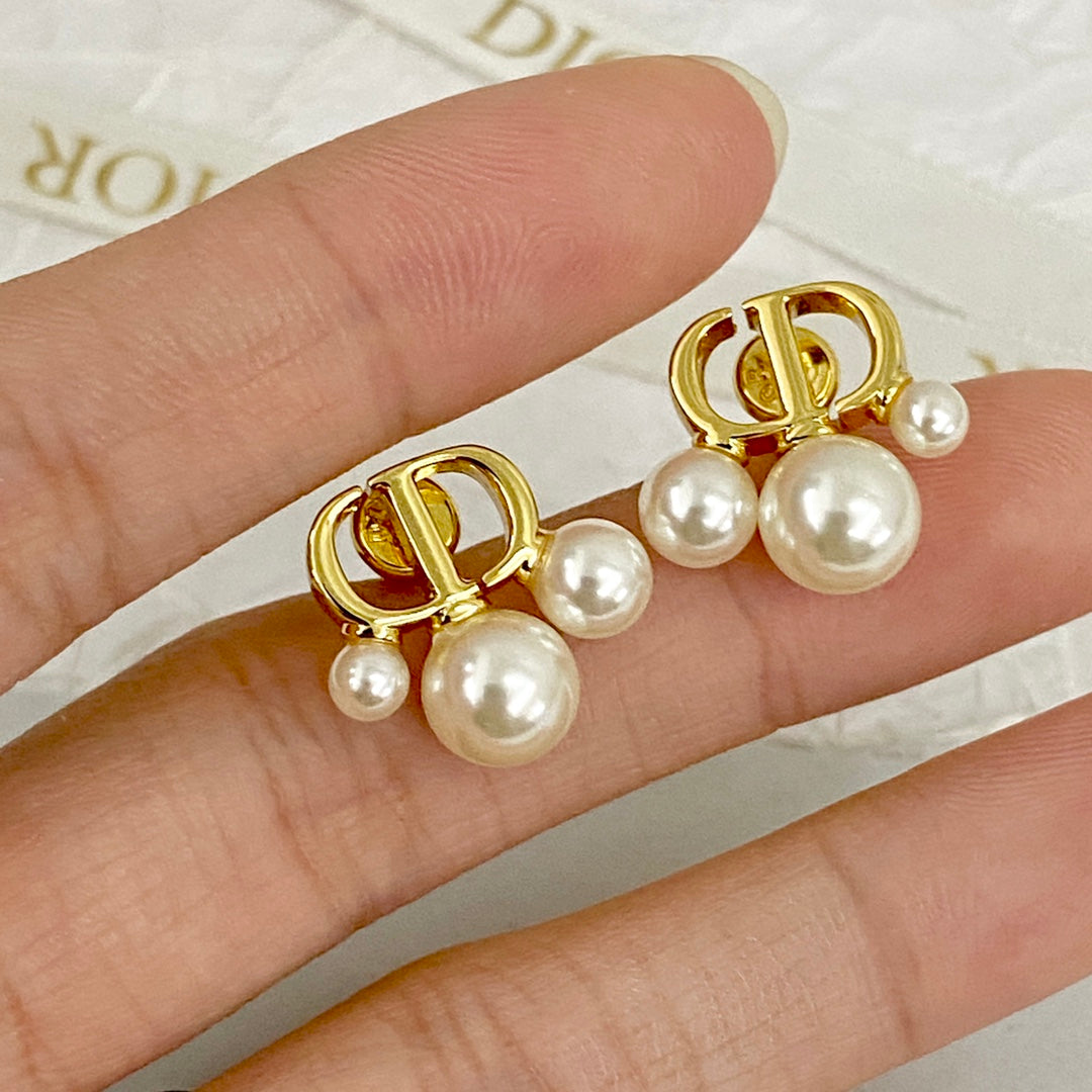 do golden cd pearl earrings