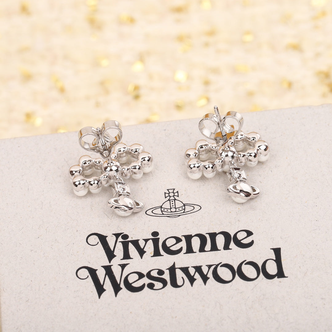 silver rotating bead bow earrings eha276