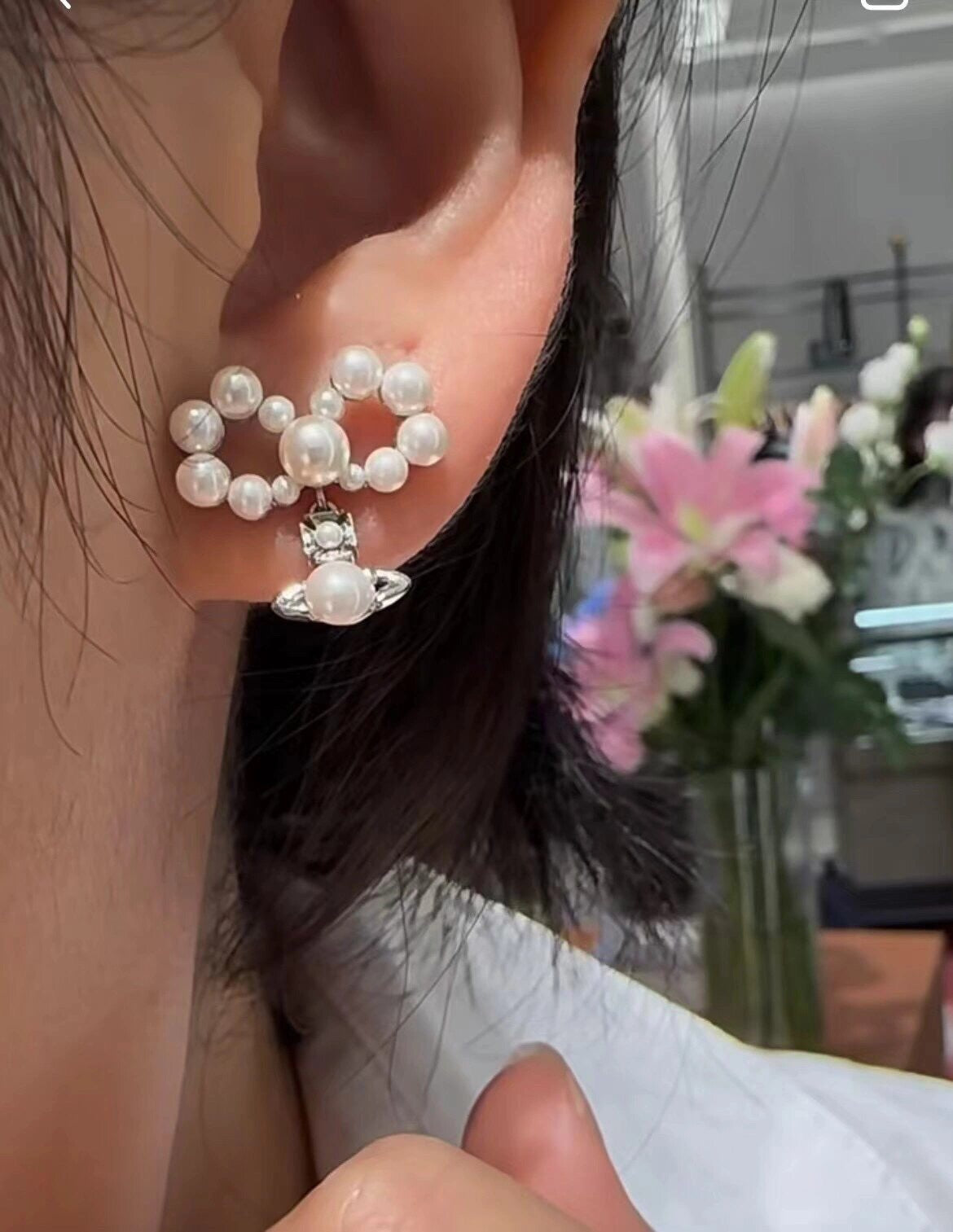 silver rotating bead bow earrings eha276