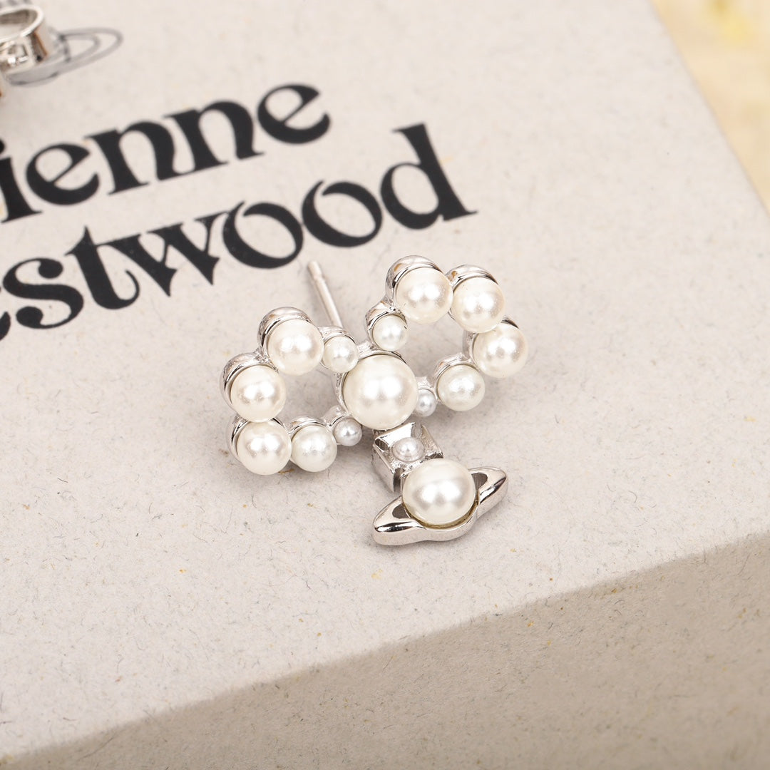 silver rotating bead bow earrings eha276
