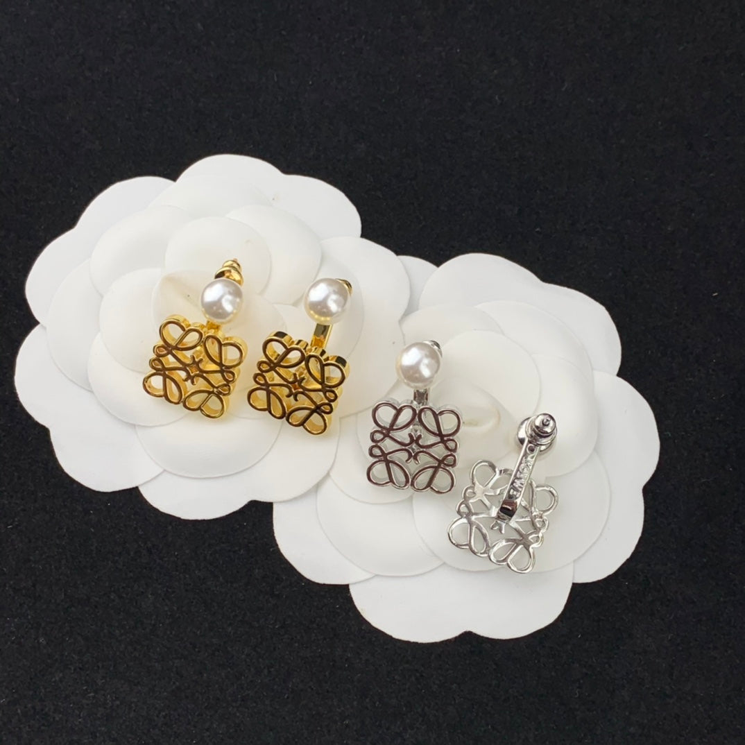 pearl hanging directional hollow earrings eha363