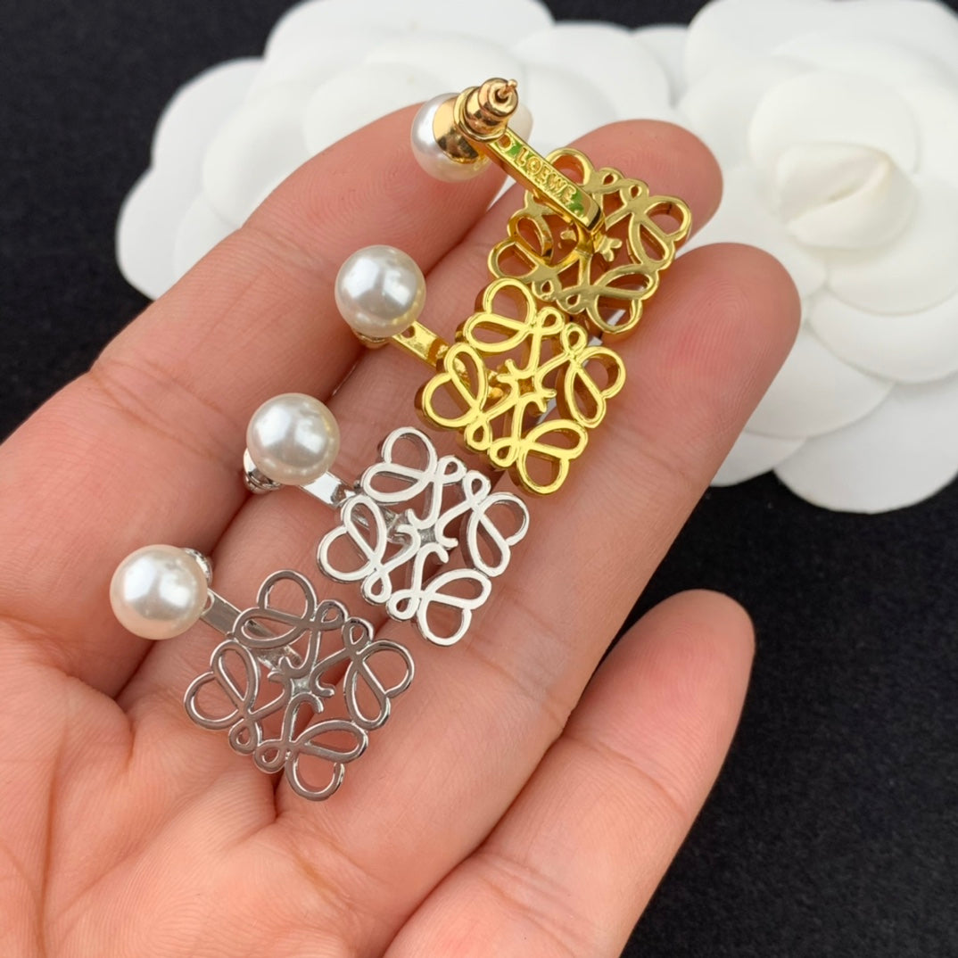 pearl hanging directional hollow earrings eha363