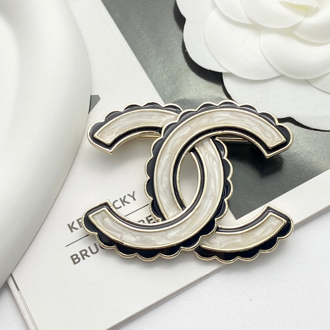 24 black enamel lace double c brooch xza13