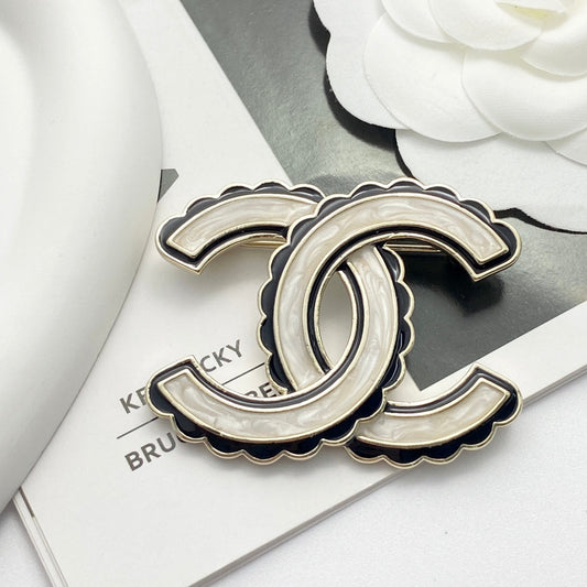 24 black enamel lace double c brooch xza13