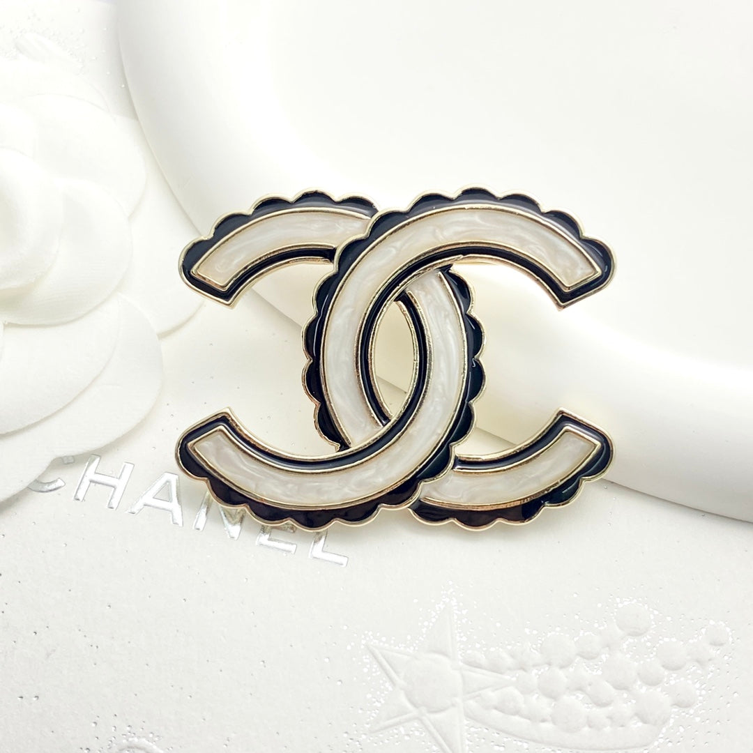 24 black enamel lace double c brooch xza13